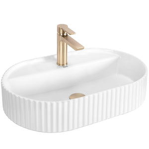 Chiuvetă de blat Marcela 60 cm din ceramică sanitară alb lucios, formă ovală elegantă cu suprafață exterioară striată decorativă.
