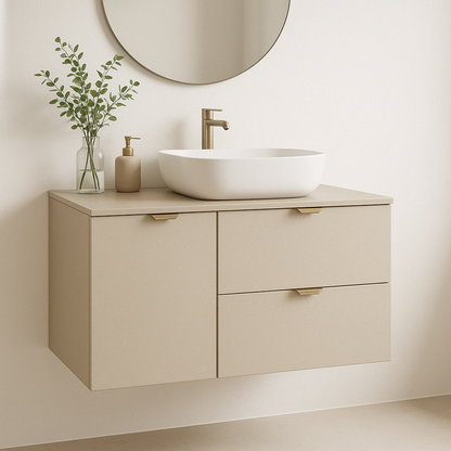 Waschtischunterschrank 100 cm Kaschmir mit Wäschekorb und goldenen Griffen im modernen Badezimmer.