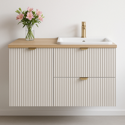 Dulap lavoar Willy 100 cm Cășmir cu blat Nuc, fronturi riflate, mânere metalice, sertare SOFT-CLOSE și coș de rufe integrat – design elegant și practic.